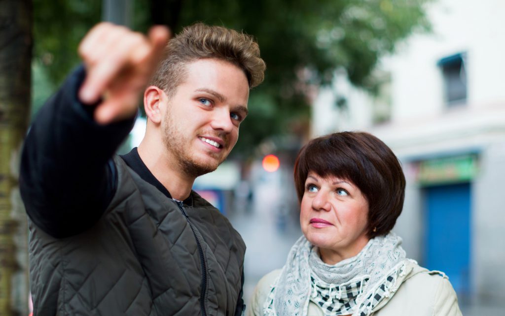 local man shows the way  for female tourist