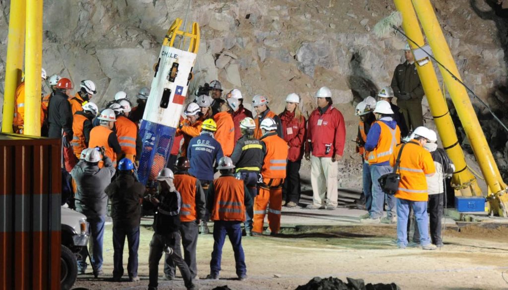 Rescuer Manuel Gonzalez starts the rescue operation of the 33 trapped miners,at the San Jose mine, near Copiapo, Chile on October 12, 2010. Chilean officials advanced by several hours the start of the unprecedented operation --which was due to start about midnight Tuesday (0300 GMT Wednesday) and will now begin at 8:00 pm (2300 GMT Tuesday)-- to haul the workers to the surface. AFP PHOTO/ Rodrigo ARANGUA (Photo credit should read RODRIGO ARANGUA/AFP via Getty Images)