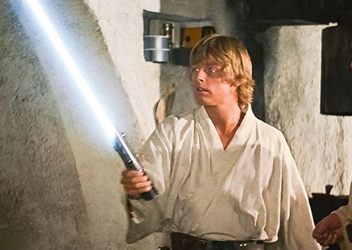 אובי ואן קנובי מעניק ללוק סקייווקר את חרב האור של אביו, אנאקין סקייווקר | Landmark Media/Alamy Stock Photo