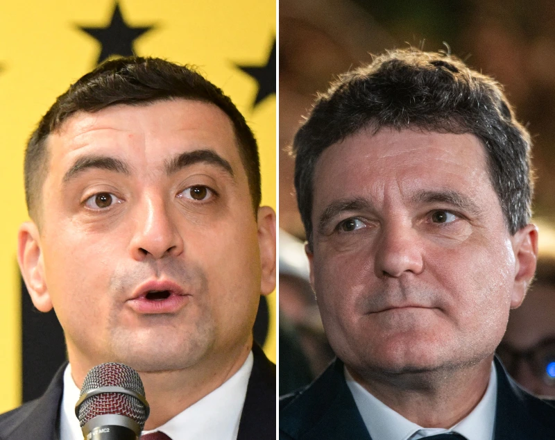 ניקושור דן, ראש עיריית בוקרשט, וג'ורג' סימיון, מנהיג מפלגת AUR