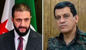 מפקד כוחות ה-SDF הכורדים, מזלום עבדי, ונשיא סוריה, אחמד א-שרע